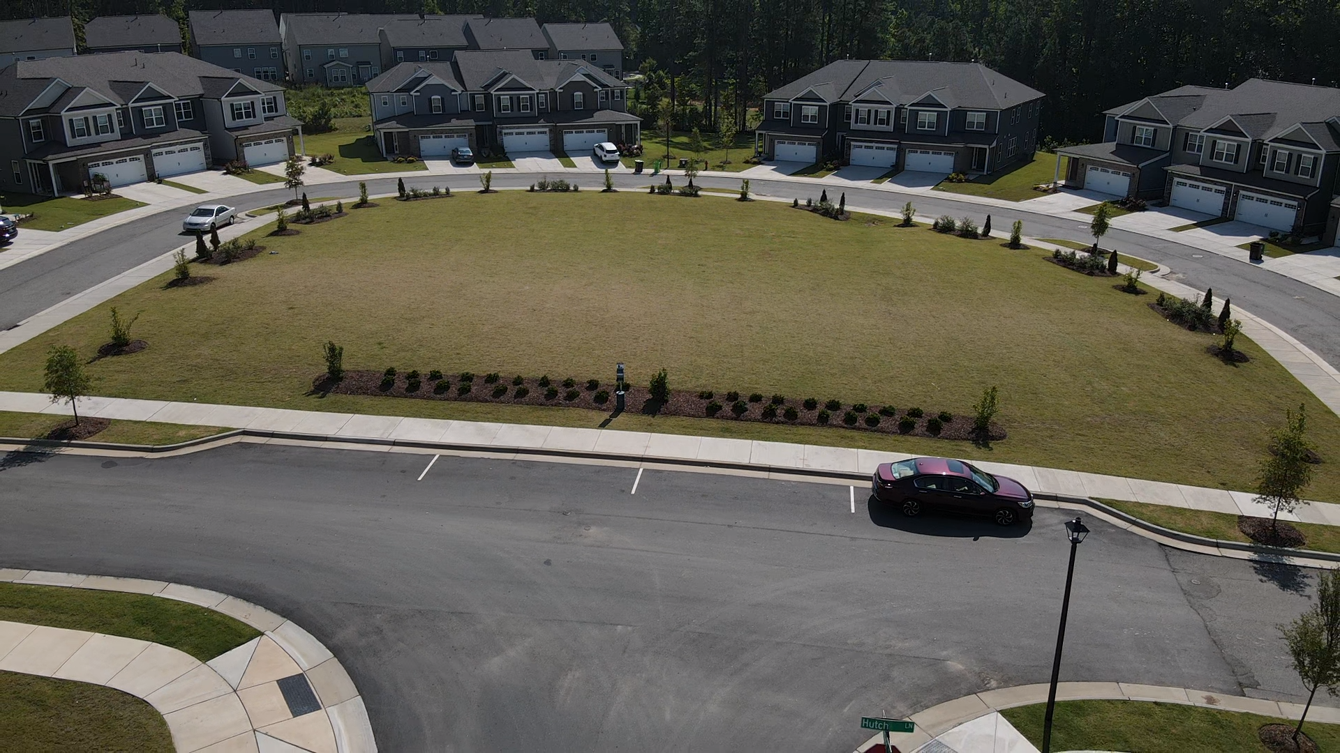 Open green space with townhouses