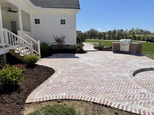 Elegant Brick Patio with Grill