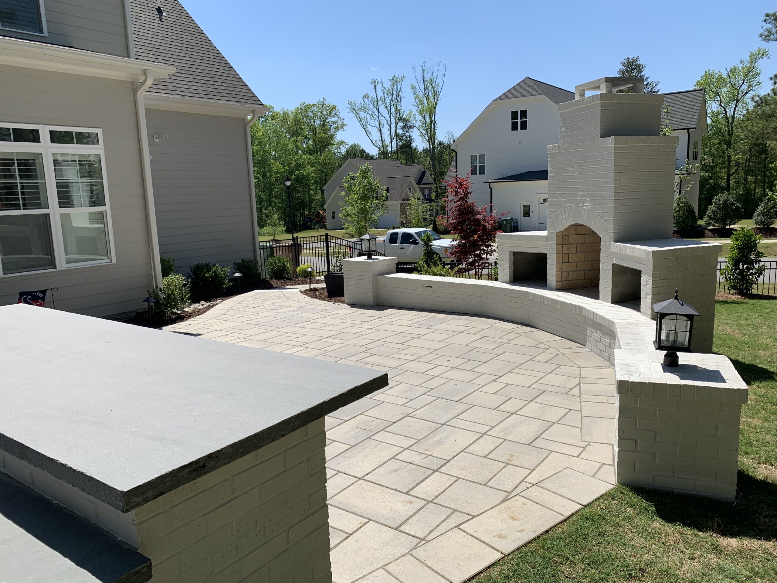 Spacious outdoor patio with fireplace