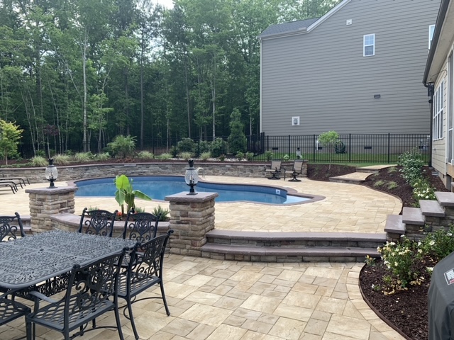 Elegant Poolside Patio with Columns